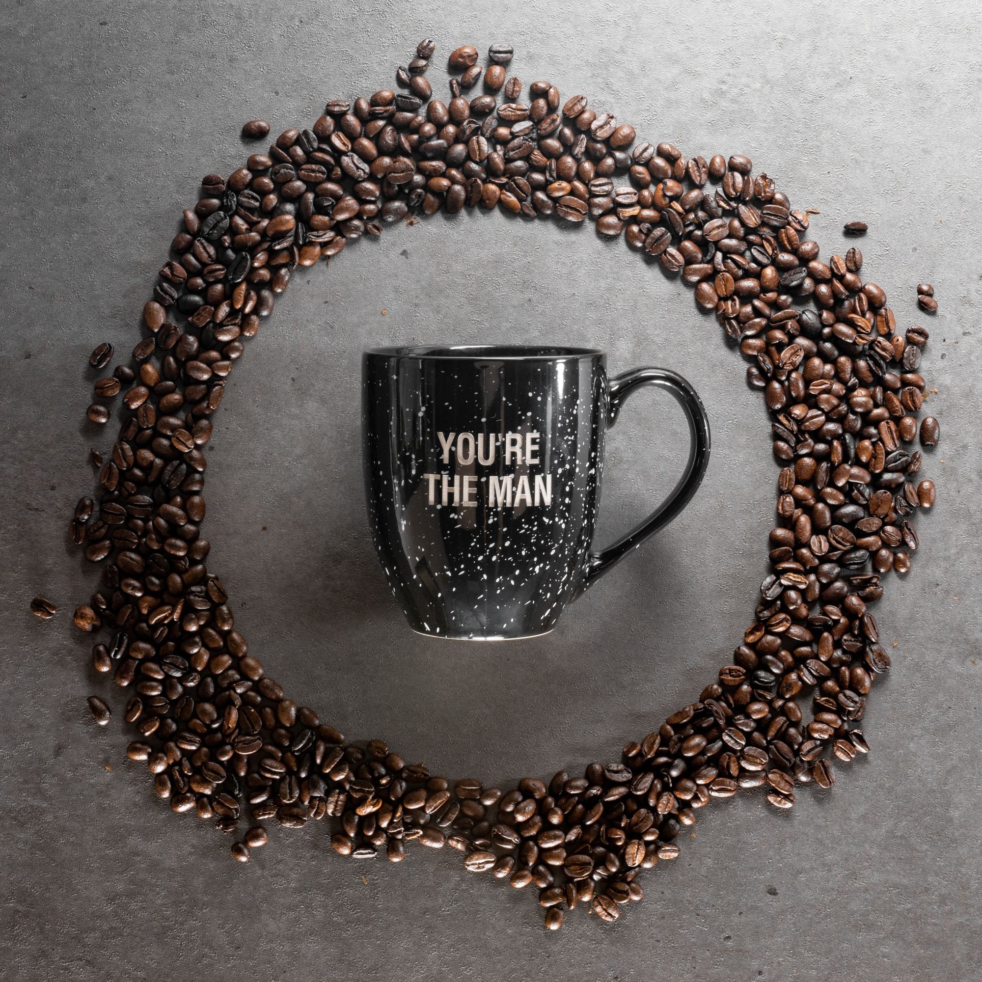 https://bunnyjamesboxes.com/cdn/shop/products/bunny-james-boxes-mugs-black-with-white-speckles-you-re-the-man-coffee-mug-29460036911138.jpg?v=1684506552